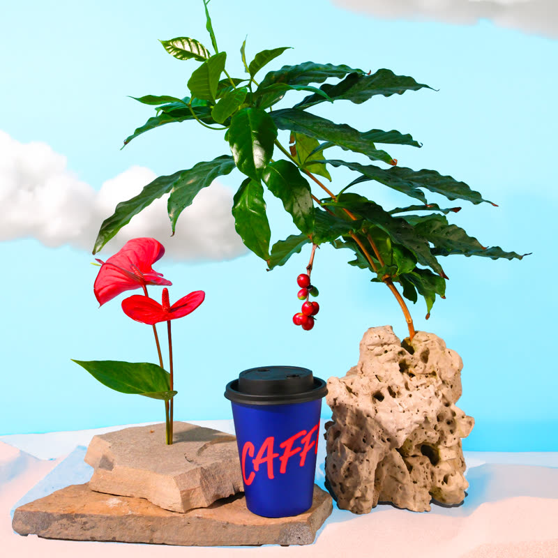 A Caffeo cup styled on a miniature tropical island set